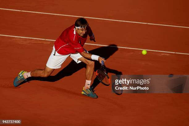 David Ferrer of Spain in action in his match against Philipp Kohlschreiber of Germany during day three of the Davis Cup World Group Quarter Finals...