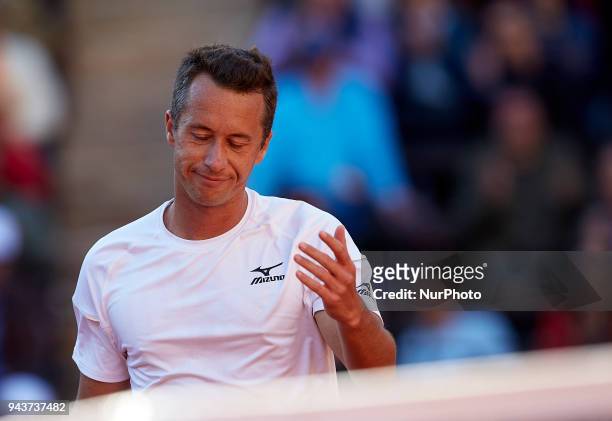 Philipp Kohlschreiber of Germany reacts in his match against David Ferrer of Spain during day three of the Davis Cup World Group Quarter Finals match...