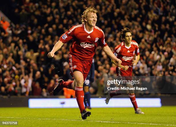 Dirk Kuyt of Liverpool celebrates scoring the opening goal during the Barclays Premier League match between Liverpool and Arsenal at Anfield on...