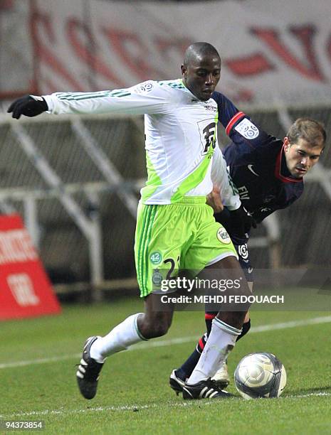 Saint-Etienne's Mouhamadou Dabo vies with Paris Saint-Germain's Christophe Jallet during their French L1 football match on December 13, 2009 at the...