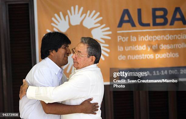 Bolivia's President Evo Morales hugs Cuba's President Raul Castro , brother of Revolution leader Fidel Castro, during the welcome ceremony of the 8th...