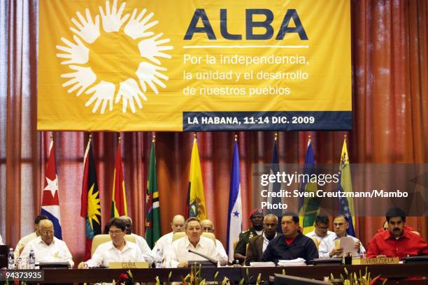 Cuba's President Raul Castro , brother of Revolution leader Fidel Castro, delivers opening remarks as he sits next to Hugo Chavez , President of...