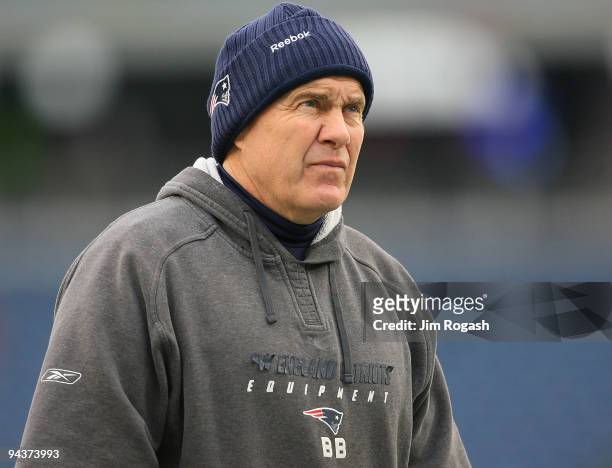 Head coach Bill Belichick of the New England Patriots walks the field before a game against the Carolina Panthers at Gillette Stadium on December 13,...
