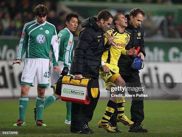 Mohamed Zidan of Dortmund is seen injured during the Bundesliga match between VfL Wolfsburg and Borussia Dortmund at the Volkswagen Arena on December...