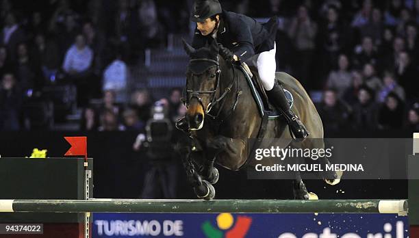 Ireland's Denis Lynch rides his horse All Inclusive during the Paris-Villepinte's International Jumping Grand Prix, on December 13, 2009 in...