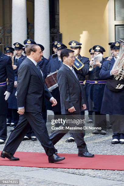 Italian Prime Minister Silvio Berlusconi welcomes the Vietnamese President Nguyen Minh Triet on December 12, 2009 in Milan, Italy. The two premiers...