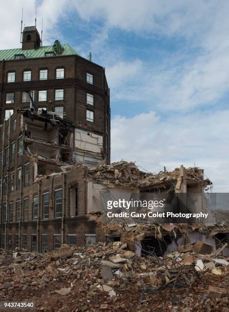 huge partly demolished building - gary colet stock pictures, royalty-free photos & images
