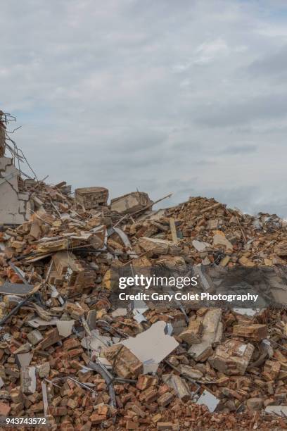 demolition rubble and sky - gary colet stock pictures, royalty-free photos & images