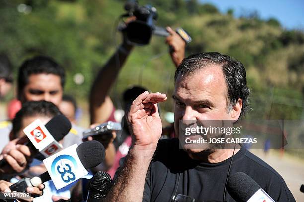 Argentine Marcelo Bielsa, head coach of the Chilean national football team, speaks with the press in the neighbourhood of La Campanera in Soyapango,...