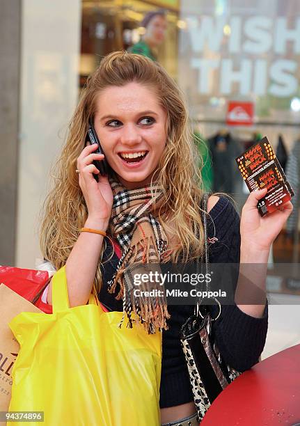 Mall shoppers attend the LG Chocolate Touch Name That Track Challenge at Garden State Plaza Mall - AMC Theater on December 12, 2009 in Paramus, New...