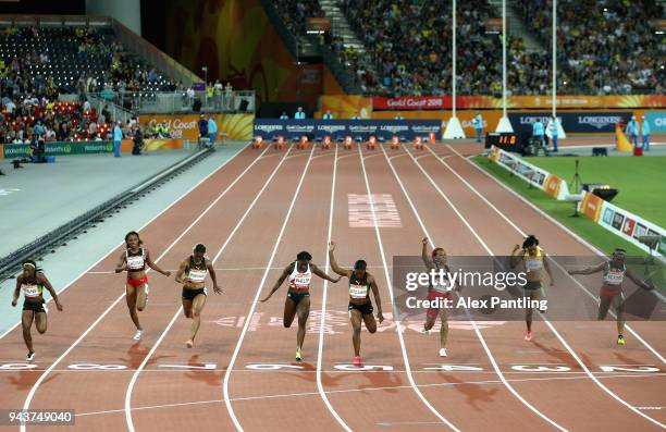 Michelle-Lee Ahye of Trinidad and Tobago races to the line to win gold in the Women's 100 metres final during the Athletics on day five of the Gold...