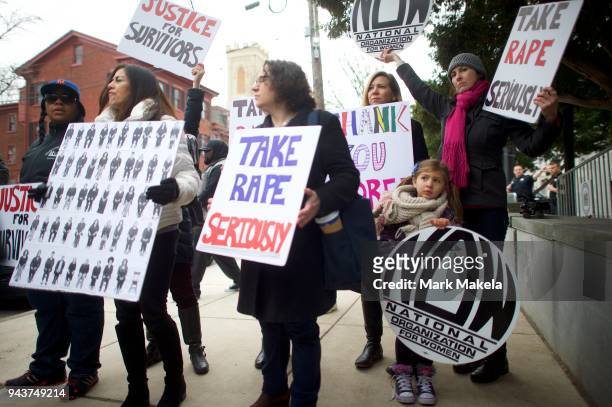 Liora Rose Radicella joins protestors demonstrating outside the Montgomery County Courthouse as Bill Cosby arrives for the first day of his sexual...