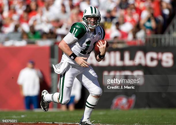 Quarterback Kellen Clemens of the New York Jets runs the ball against the Tampa Bay Buccaneers during the game at Raymond James Stadium on December...