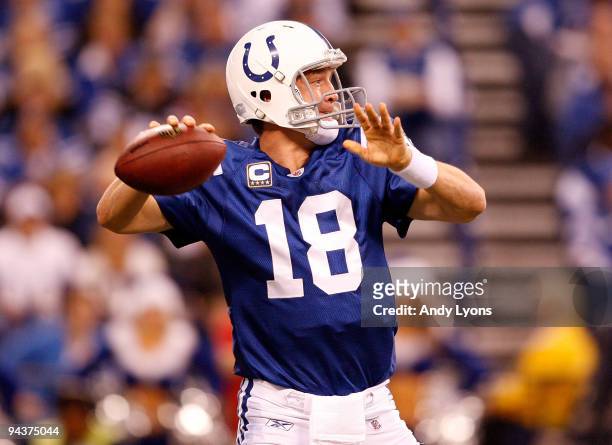 Peyton Manning of the Indianapolis Colts throws the ball during the NFL game against the Denver Broncos at Lucas Oil Stadium on December 13, 2009 in...