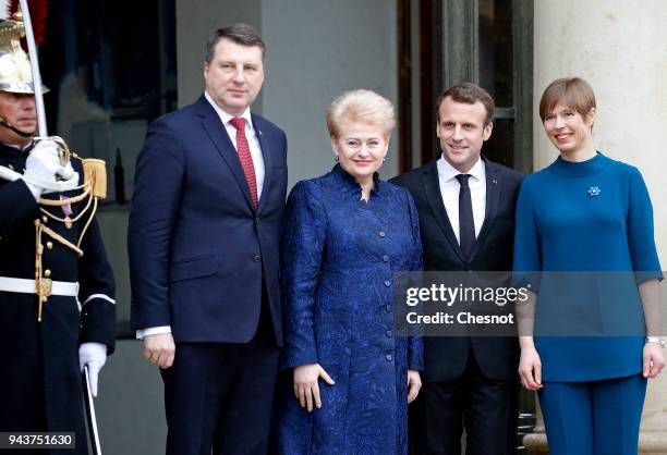 French President Emmanuel Macron poses with Lithuania's President Dalia Grybauskaite , Latvia's President Raimonds Vejonis and Estonia's President...