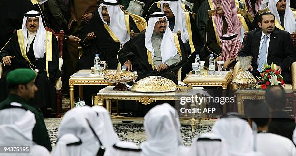 Saudi Crown Prince Sultan bin Abdul Aziz al-Saud sits between Bahrain's King Hamad bin Issa al-Khalifa and Lebanese Prime Minister Saad Hariri during...