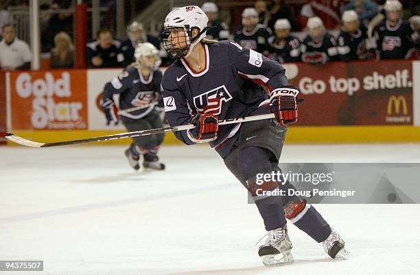 Angela Ruggiero of the USA skates against Canada during their Women's Ice Hockey match at the Magness Arena on the Denver University campus on...