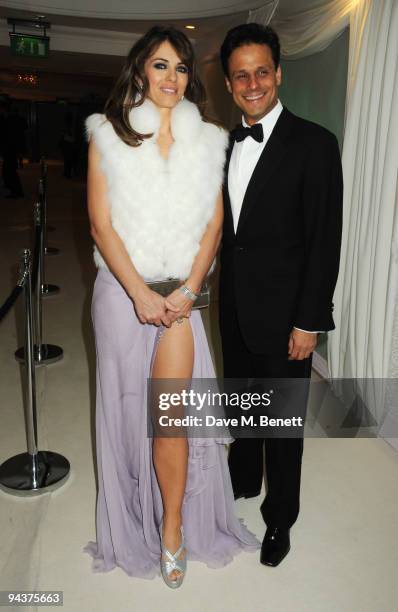 Elizabeth Hurley and Arun Nayar attend the Grey Goose Character & Cocktails Winter Fundraiser Ball in aid of the Elton John AIDS Foundation, at the...