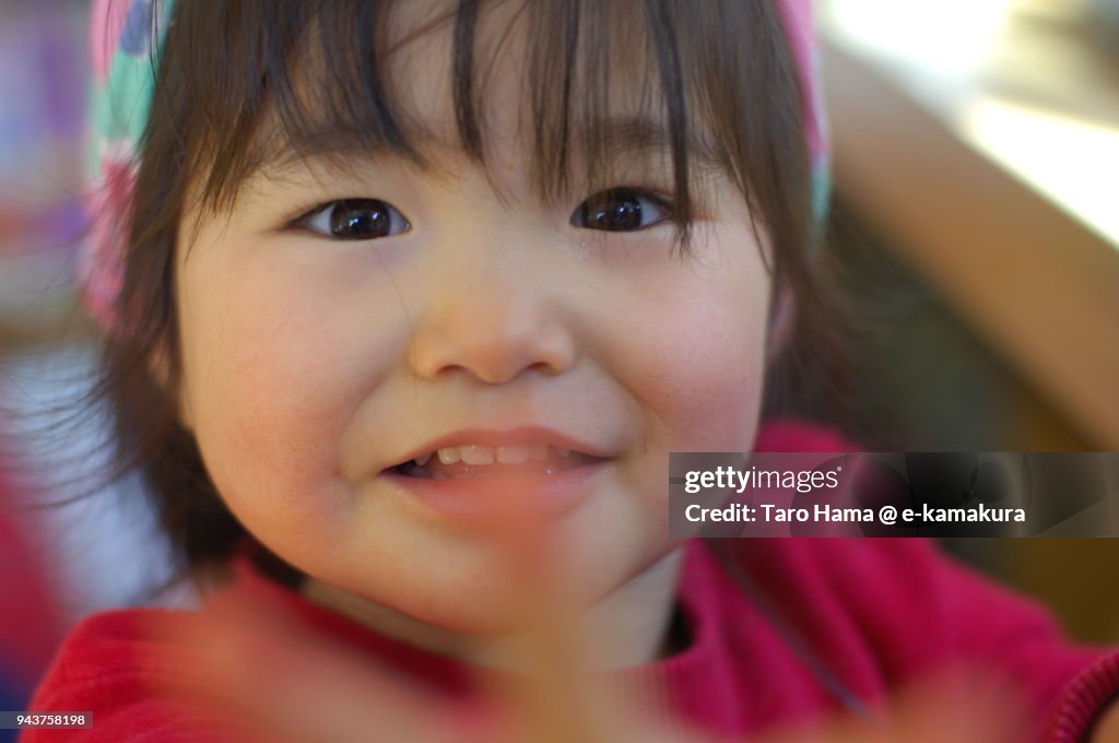 A girl enjoying the event in kindergarten