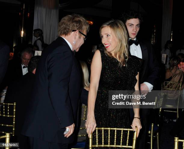 Sir Elton John, Sam Taylor-Wood and Aaron Johnson attend the Grey Goose Character & Cocktails Winter Fundraiser Ball in aid of the Elton John AIDS...