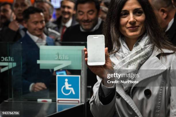 The Mayor of Rome Virgina Raggi while showing the Bits Payment with smartphone ,Press Conference 'Atac + Facile ' at the Termini station, presented...