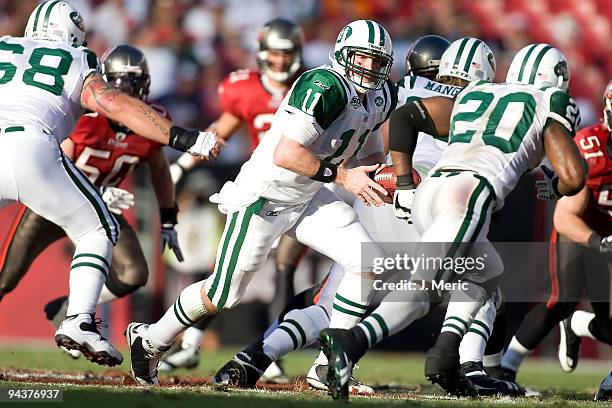 Quarterback Kellen Clemens of the New York Jets hands the ball off against the Tampa Bay Buccaneers during the game at Raymond James Stadium on...