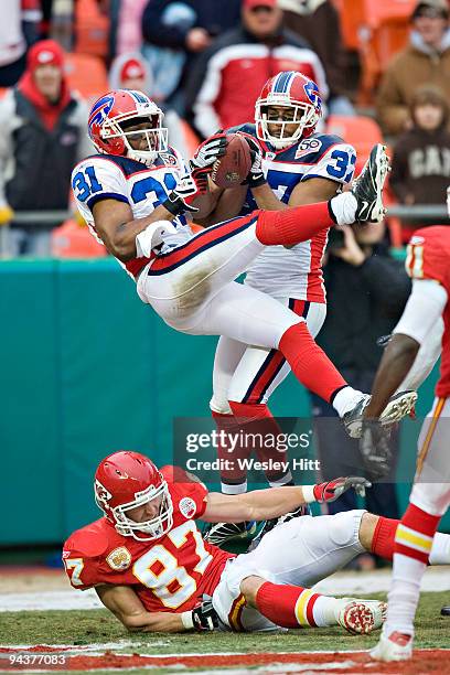 Defensive back George Wilson of the Buffalo Bills intercepts a pass in the end zone to seal the victory against the Kansas City Chiefs at Arrowhead...