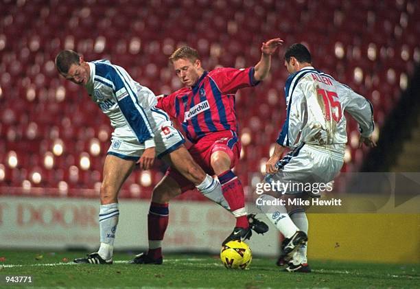 Mikael Forssell of Crystal Palace takes on Clint Hill and Graham Allen of Tranmere Rovers during the Worthington Cup fourth round match at Selhurst...