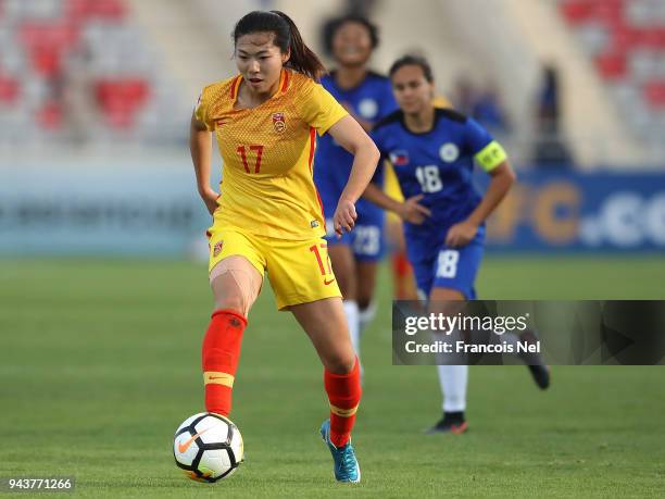 Gu Yasha of China in action during the AFC Women's Asian Cup Group A match between Philippines and China at the King Abdullah II Stadium on April 9,...
