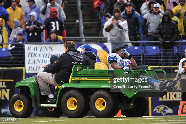 Kevin Smith of the Detroit Lions is carted off the field after a leg injury during the game against the Baltimore Ravens at M&T Bank Stadium on...