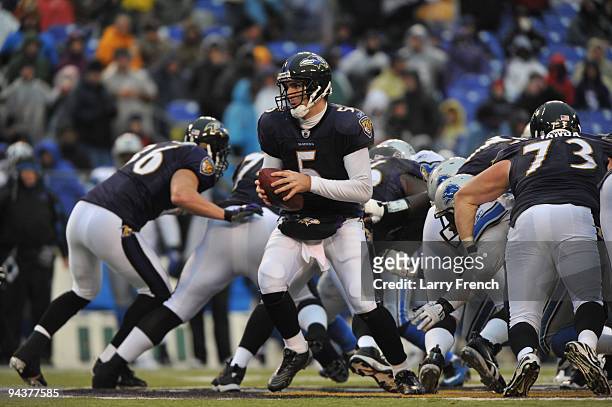 Joe Flacco of the Baltimore Ravens hands off during the game against the Detroit Lions at M&T Bank Stadium on December 13, 2009 in Baltimore,...