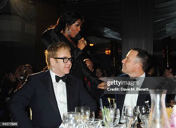 Sir Elton John, Kelly Rowland and David Furnish attend the Grey Goose Character & Cocktails Winter Fundraiser Ball in aid of the Elton John AIDS...