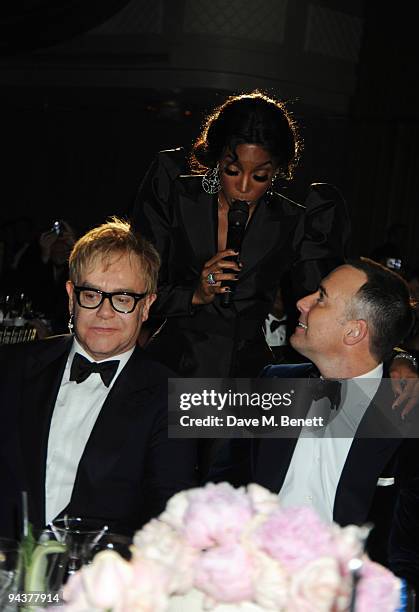 Sir Elton John, Kelly Rowland and David Furnish attend the Grey Goose Character & Cocktails Winter Fundraiser Ball in aid of the Elton John AIDS...