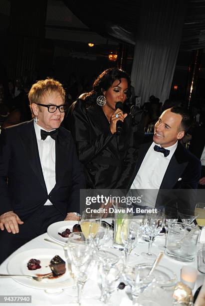 Sir Elton John, Kelly Rowland and David Furnish attend the Grey Goose Character & Cocktails Winter Fundraiser Ball in aid of the Elton John AIDS...