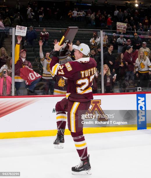 Riley Tufte of the Minnesota Duluth Bulldogs celebrates after winning the national championship against the Notre Dame Fighting Irish 2-1 during the...