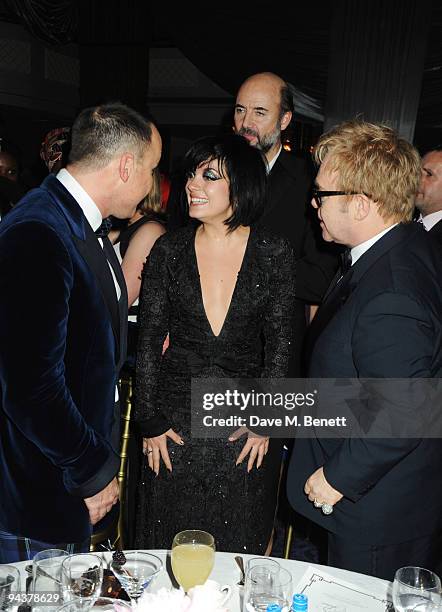 David Furnish, Lily Allen and Sir Elton John attend the Grey Goose Character & Cocktails Winter Fundraiser Ball in aid of the Elton John AIDS...