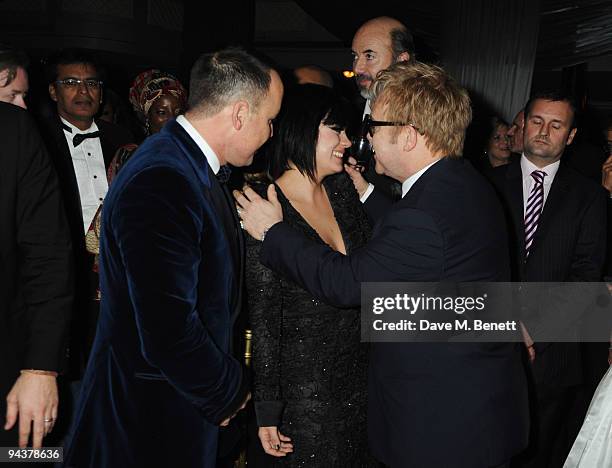 David Furnish, Lily Allen and Sir Elton John attend the Grey Goose Character & Cocktails Winter Fundraiser Ball in aid of the Elton John AIDS...