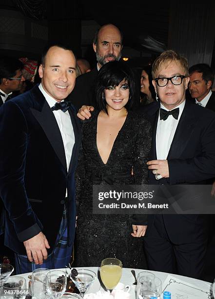 David Furnish, Lily Allen and Sir Elton John attend the Grey Goose Character & Cocktails Winter Fundraiser Ball in aid of the Elton John AIDS...