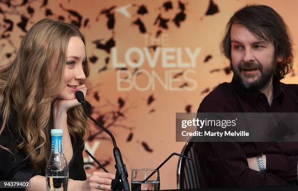 Actress Saoirse Ronan speaks with Director Peter Jackson during the The Lovely Bones press conference at Intercontinental Hotel on December 14, 2009...