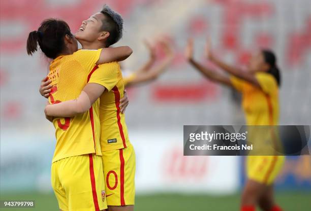 Li Ying of China celebrates scoring the third goal with Wu Haiyan during the AFC Women's Asian Cup Group A match between Philippines and China at the...