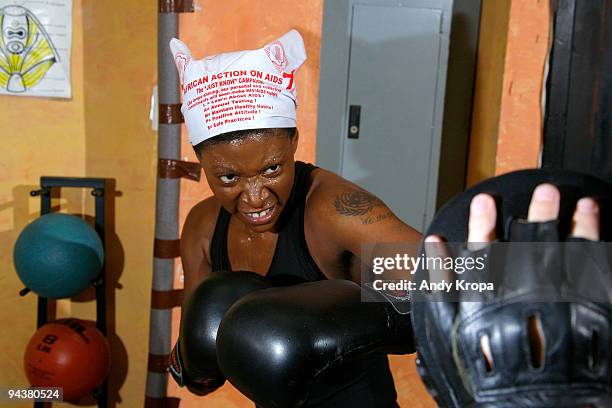 Suzanne "Africa" Engo trains to run to raise awareness for AIDS In Africa at Sal Anthony's Movement Salon on December 13, 2009 in New York City.