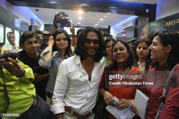 Model turned actor Milind Soman during the promotion of his film 'Bhram' at a Gitanjali showroom, in New Delhi.