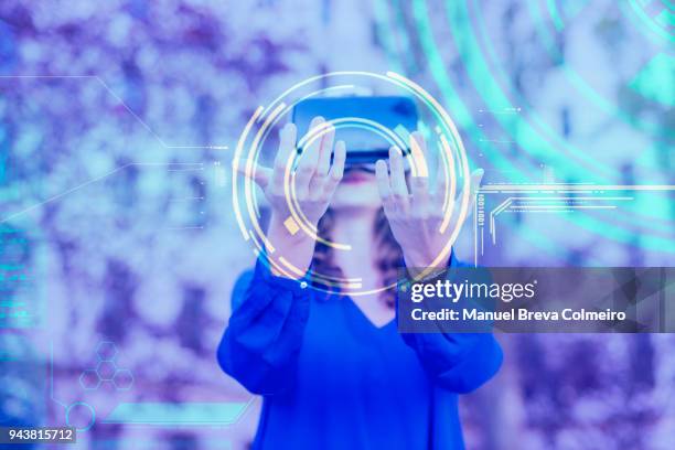 woman with vr glasses - rechnerunterstütztes konstruieren stock-fotos und bilder