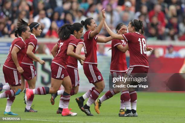 Kiana Palacios of Mexico celebrates with teamamtes after scoring the second goal of his team during the match between Mexico and United States at...