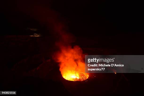 the lava lake inside the crater of nyiragongo in the night - volcanic landscape stock pictures, royalty-free photos & images