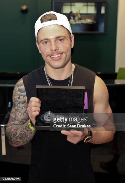 Olympian Gus Kenworthy poses with a key to the City of Miami Beach at a VIP brunch in TD Bank during the 10th Annual Miami Beach Gay Pride...