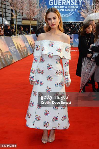 Lily James attends the World Premiere of "The Guernsey Literary And Potato Peel Pie Society" at The Curzon Mayfair on April 9, 2018 in London,...
