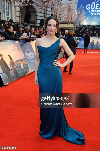Jessica Brown Findlay attends the World Premiere of "The Guernsey Literary And Potato Peel Pie Society" at The Curzon Mayfair on April 9, 2018 in...