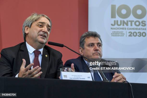 Uruguayan Sports Secretary Fernando Caceres speaks next to Uruguayan Football Association president Wilmar Valdez during a press conference on their...