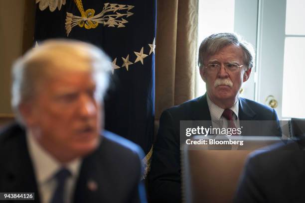 John Bolton, national security advisor, listens as U.S. President Donald Trump speaks during a cabinet meeting at the White House in Washington,...